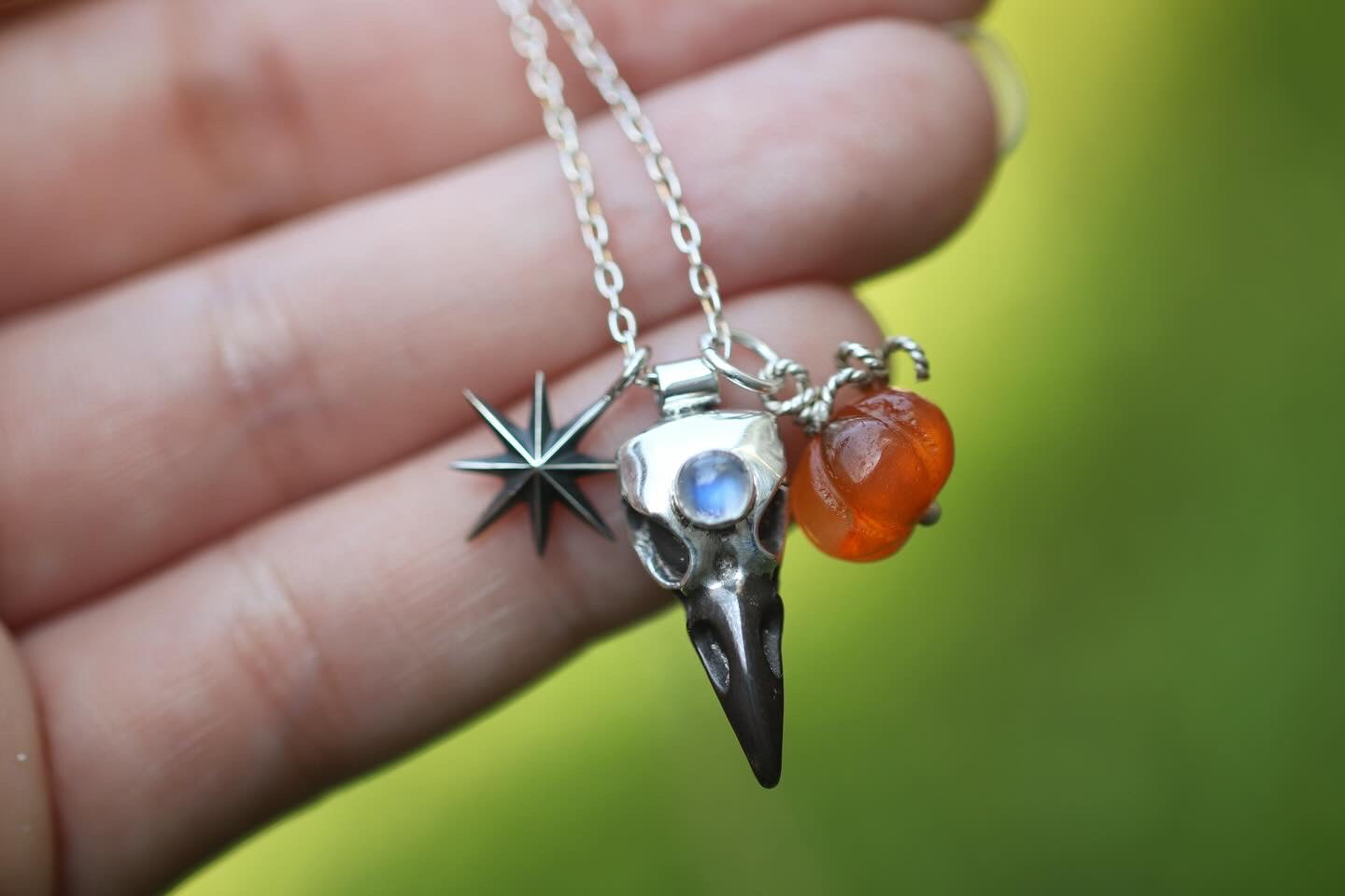 Sterling silver raven, star and carved carnelian pumpkin necklace