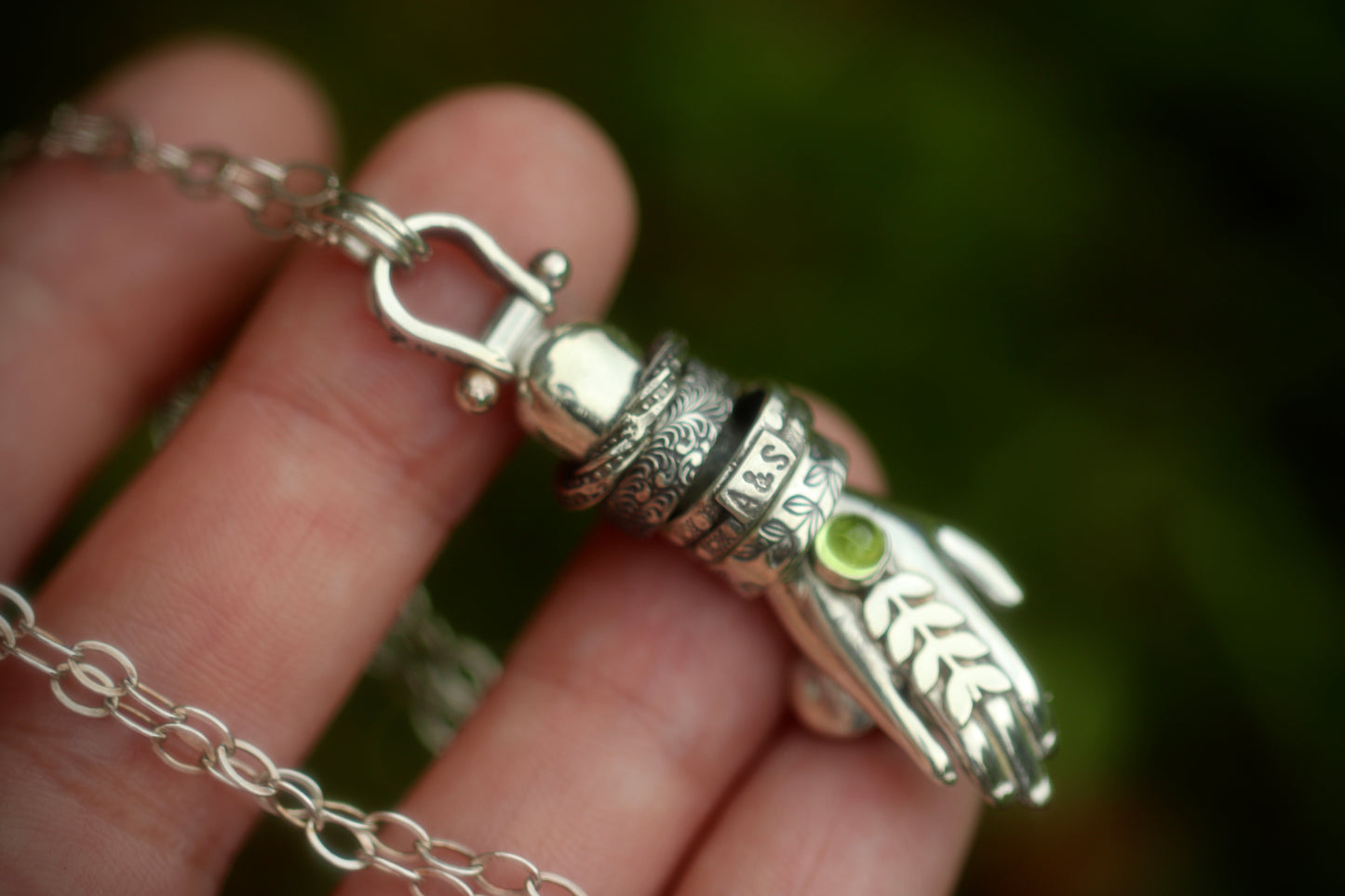 Sterling silver succulent hand necklace