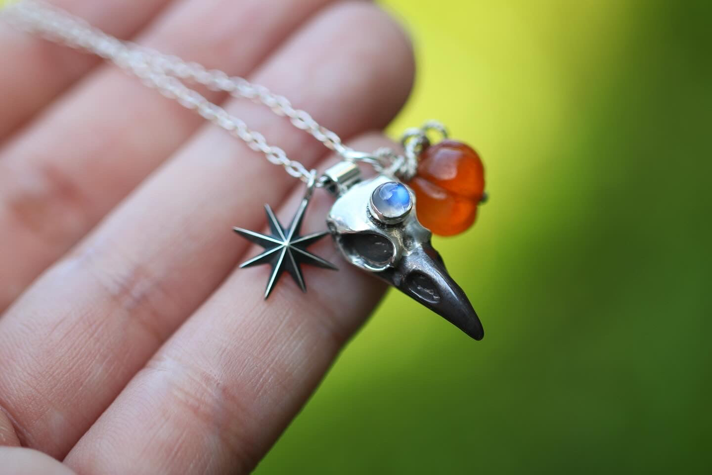 Sterling silver raven, star and carved carnelian pumpkin necklace