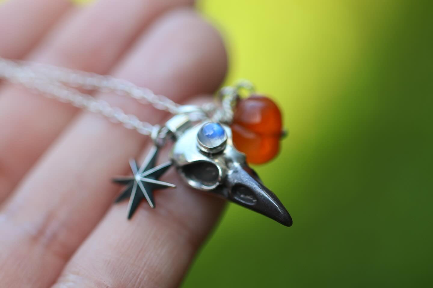 Sterling silver raven, star and carved carnelian pumpkin necklace