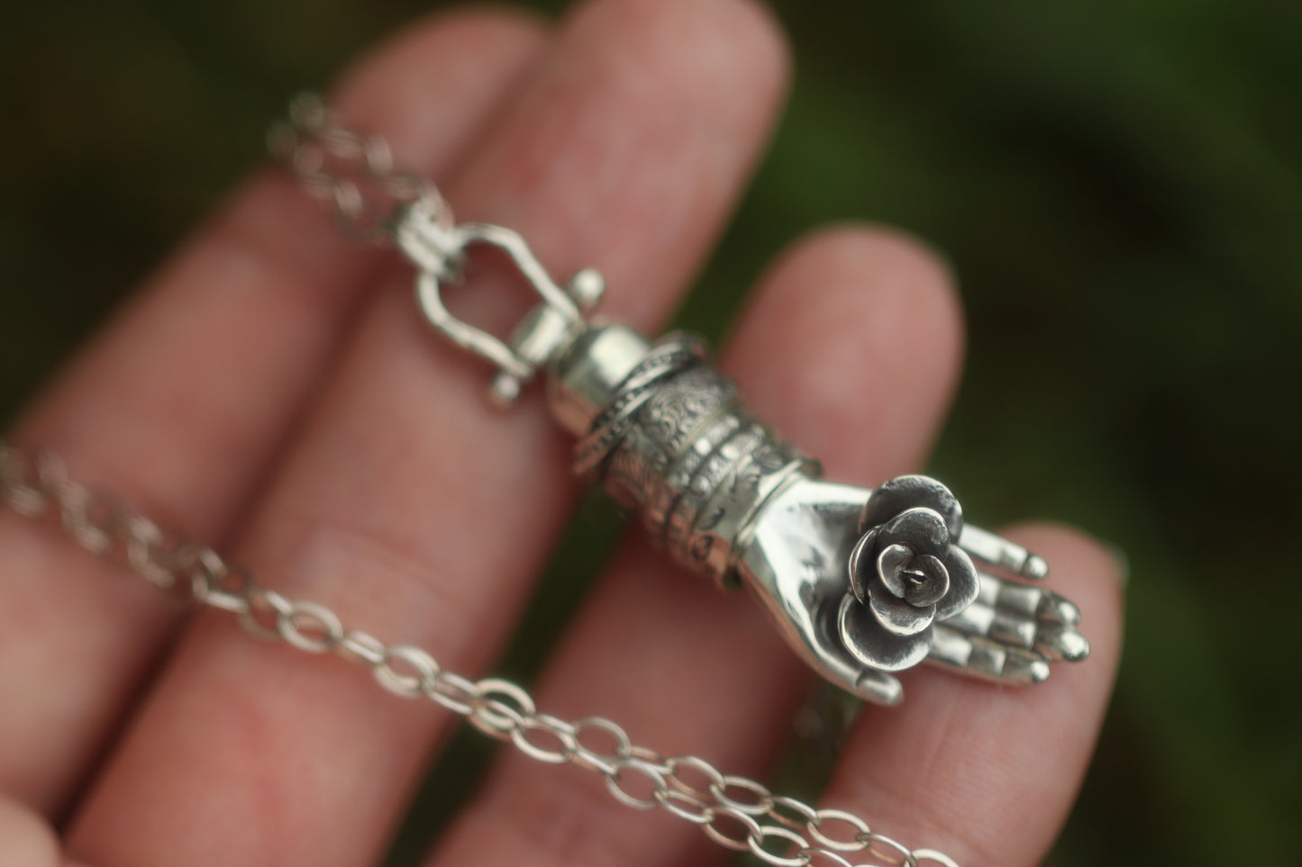 Sterling silver succulent hand necklace