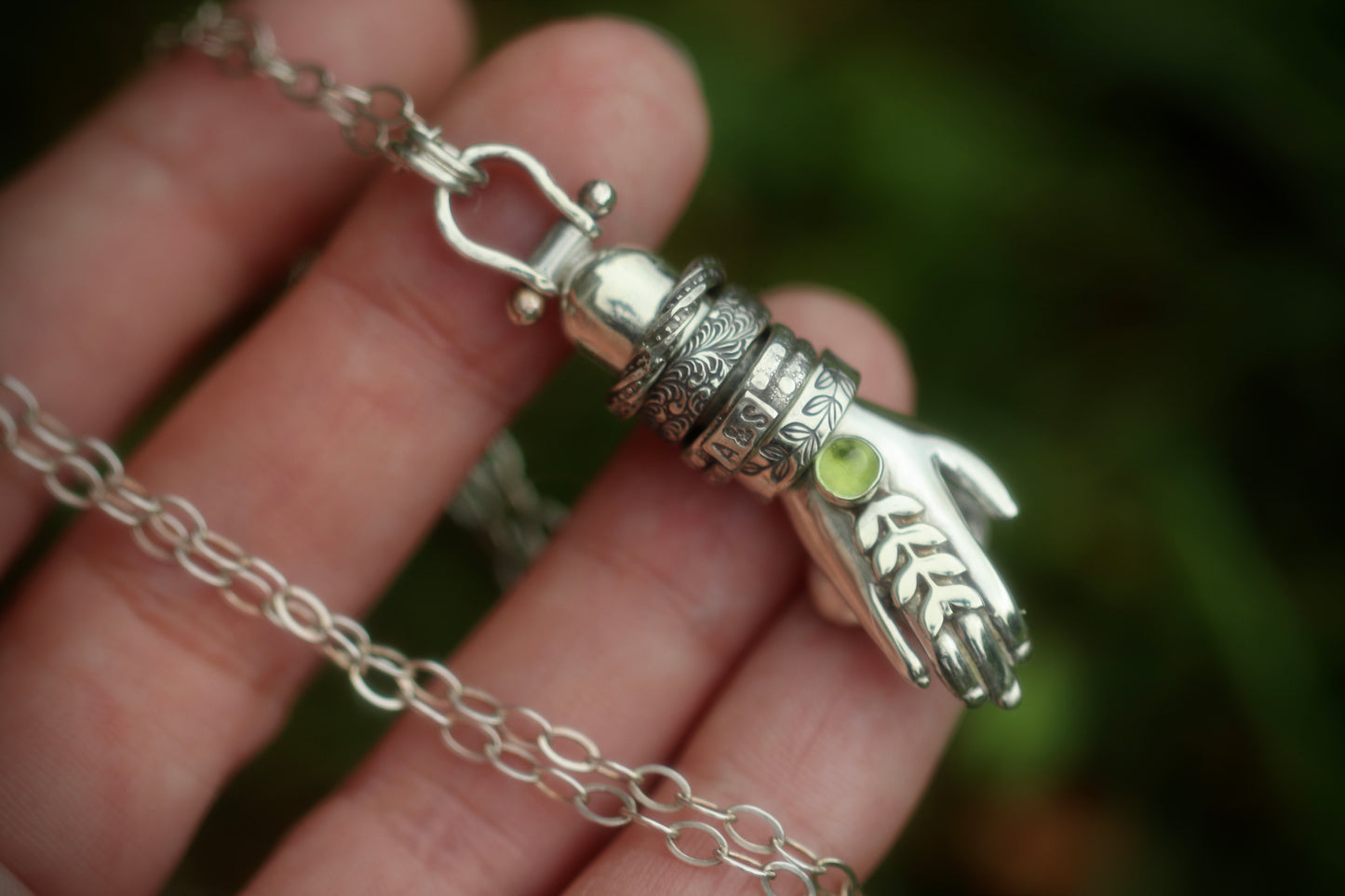 Sterling silver succulent hand necklace