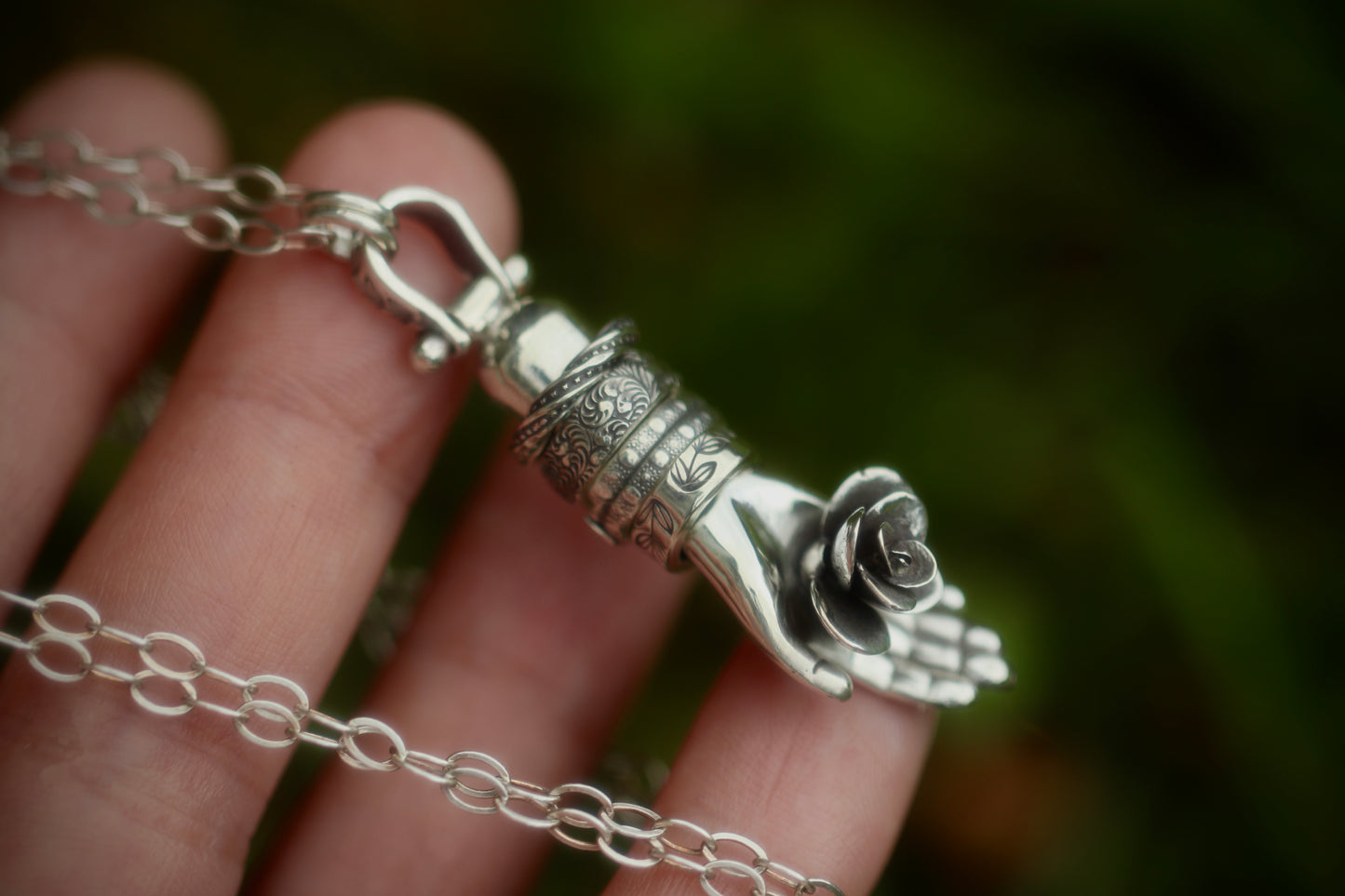 Sterling silver succulent hand necklace